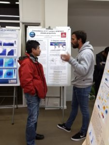 PhD affiliate Joao Morim (Griffith University) discussing his poster at the poster networking session